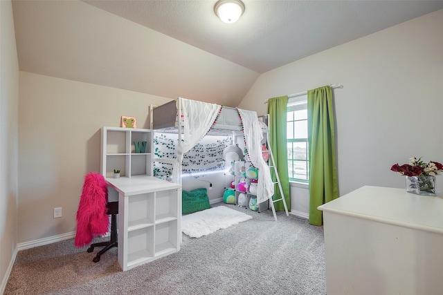 bedroom featuring carpet floors and vaulted ceiling