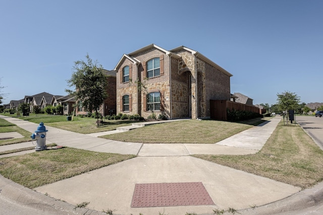 view of front of home with a front yard