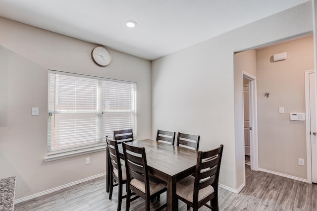 dining space featuring light hardwood / wood-style flooring