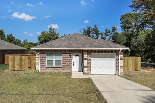 single story home with a garage and a front lawn