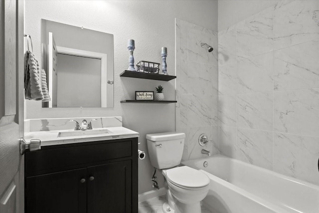 full bathroom featuring vanity, tiled shower / bath combo, and toilet