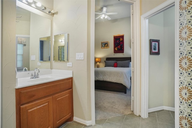 bathroom featuring vanity, tile patterned floors, and ceiling fan