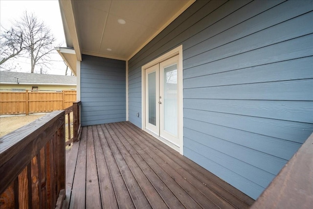 wooden deck featuring french doors