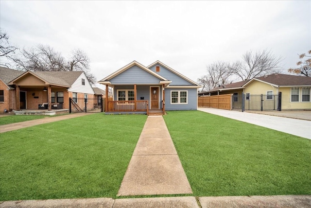 view of front of property with a front yard and covered porch