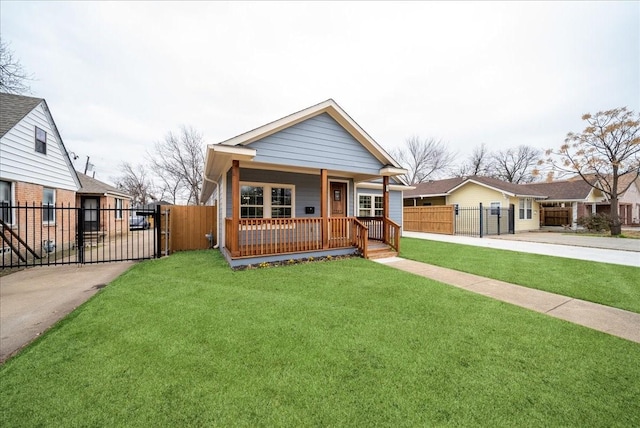 view of front facade featuring a front lawn and a porch