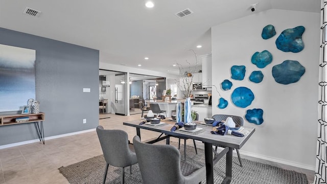 office area with vaulted ceiling and ceiling fan