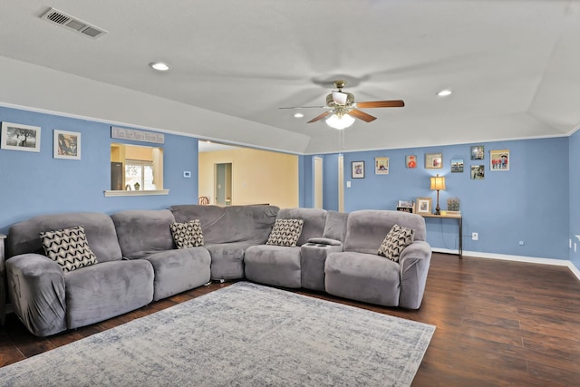 living room with vaulted ceiling, dark hardwood / wood-style floors, and ceiling fan