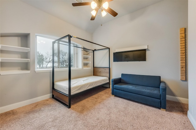 carpeted bedroom featuring vaulted ceiling and ceiling fan