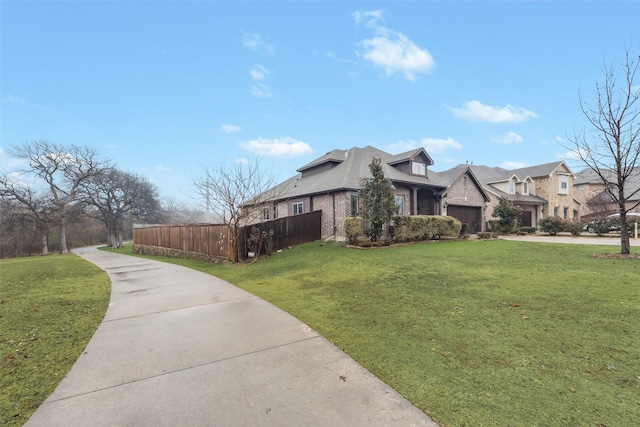 view of side of home featuring a lawn