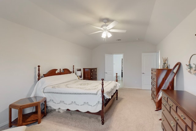 bedroom with lofted ceiling, light carpet, and ceiling fan