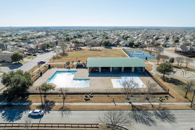 birds eye view of property with a residential view