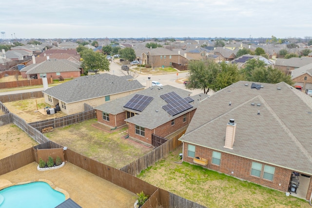 birds eye view of property with a residential view