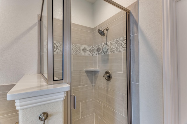 bathroom featuring walk in shower