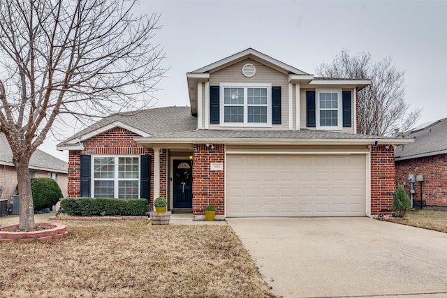 view of front of property with a garage