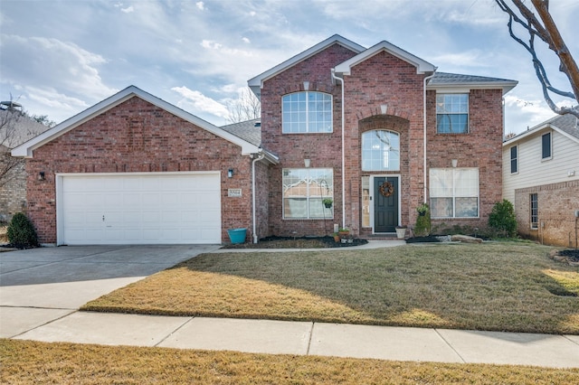 view of property with a garage and a front lawn