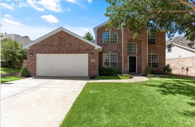 view of front property featuring a garage and a front lawn