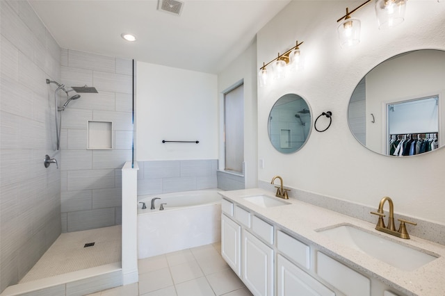 bathroom with vanity, separate shower and tub, and tile patterned floors