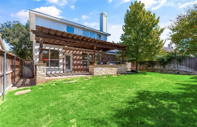 view of patio featuring a shed, a pergola, a grill, beverage cooler, and exterior kitchen