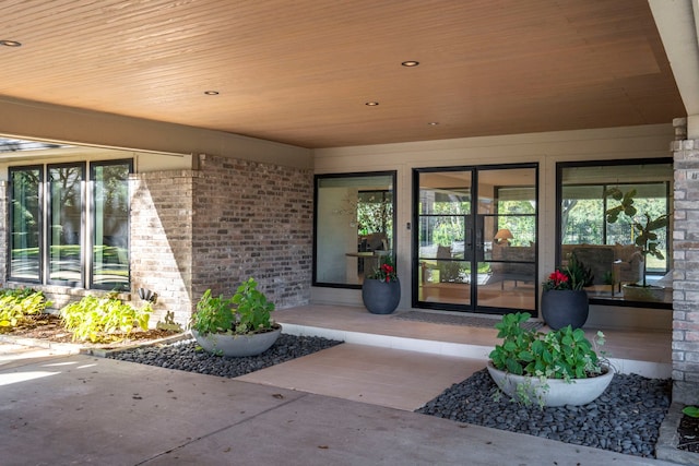 doorway to property with a patio