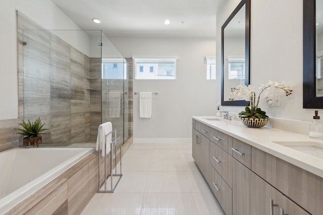 bathroom with vanity, separate shower and tub, and tile patterned floors