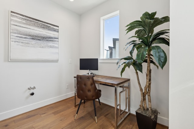 office area with wood-type flooring