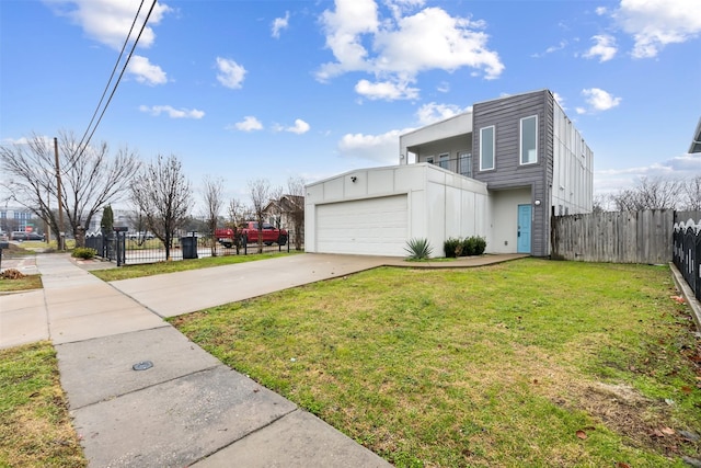 view of side of home with a garage and a yard