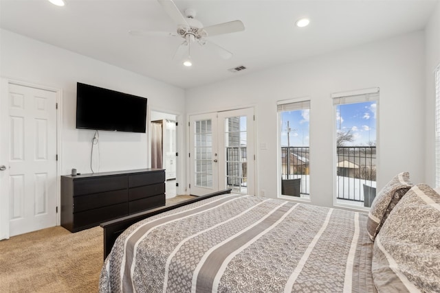 carpeted bedroom featuring french doors, ceiling fan, and access to exterior