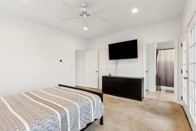 carpeted bedroom with ceiling fan