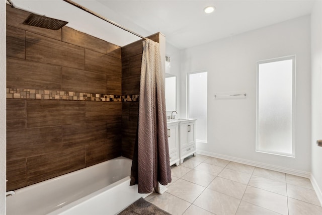 bathroom with tile patterned floors, vanity, and shower / bath combo