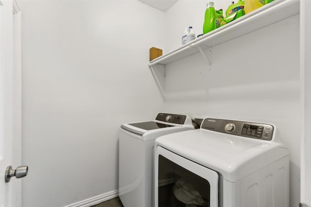 washroom with washer and clothes dryer