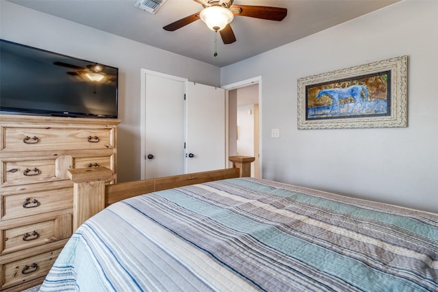 bedroom with visible vents and ceiling fan