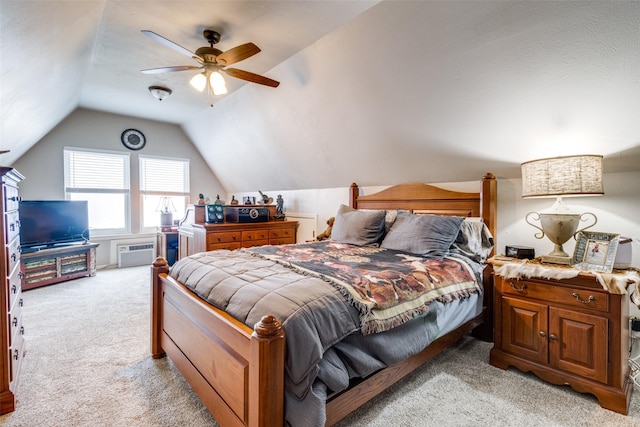 bedroom with a ceiling fan, light carpet, and lofted ceiling