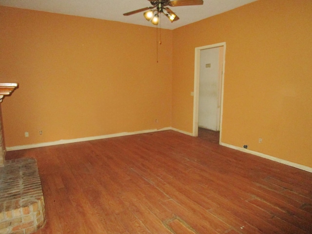 interior space featuring hardwood / wood-style floors and ceiling fan