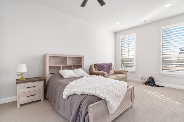 carpeted bedroom featuring ceiling fan