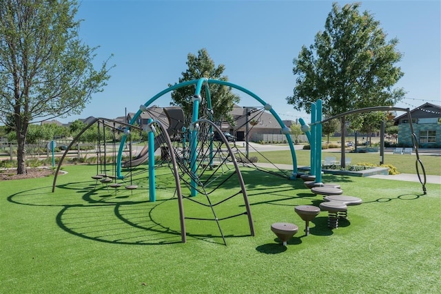 view of playground with a yard