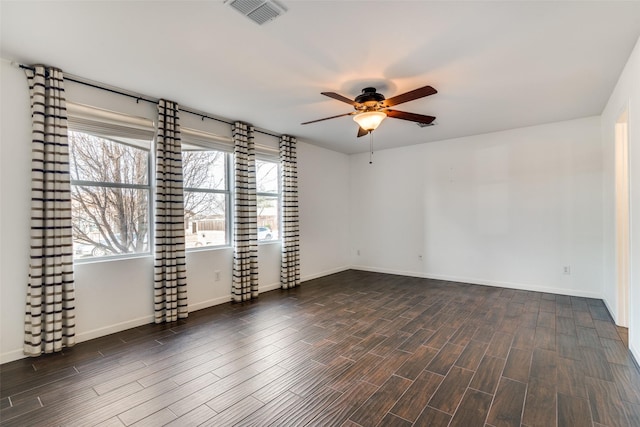 spare room with ceiling fan