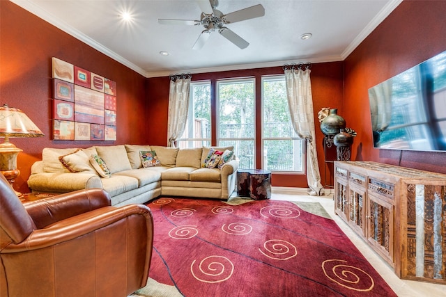 living room with ornamental molding and ceiling fan