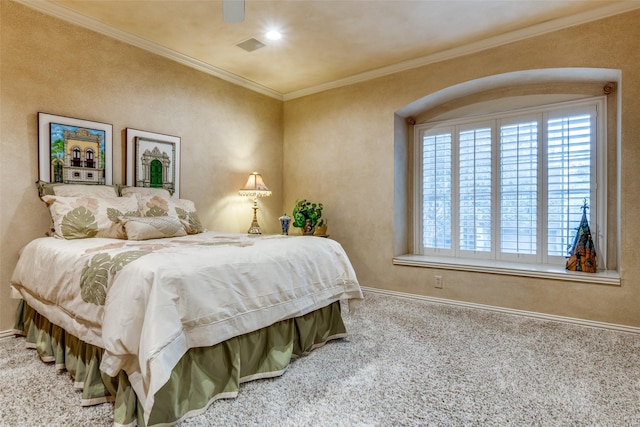 bedroom with crown molding, carpet floors, and ceiling fan