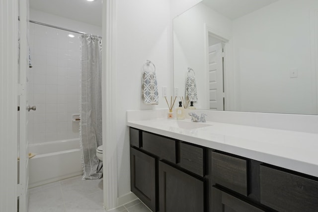 full bathroom featuring shower / tub combo with curtain, vanity, tile patterned flooring, and toilet