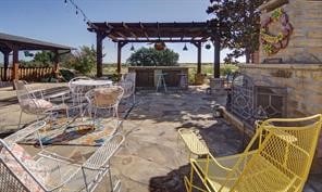 view of patio featuring a pergola