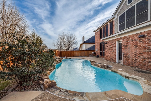 view of pool featuring a patio area