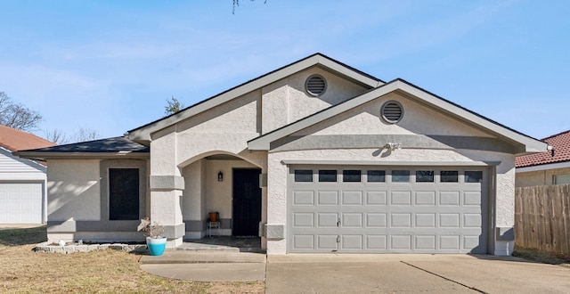 view of front of property featuring a garage