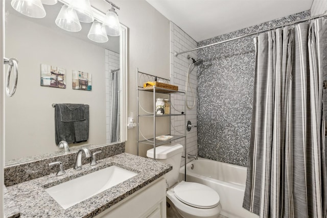 full bathroom with shower / bathtub combination with curtain, vanity, and toilet