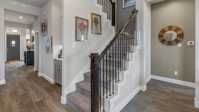 stairway with wood-type flooring