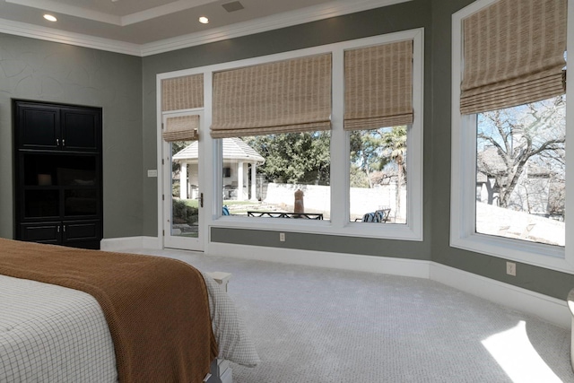 bedroom featuring crown molding, carpet floors, and access to outside