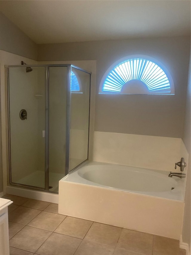 bathroom featuring tile patterned flooring, vanity, and independent shower and bath