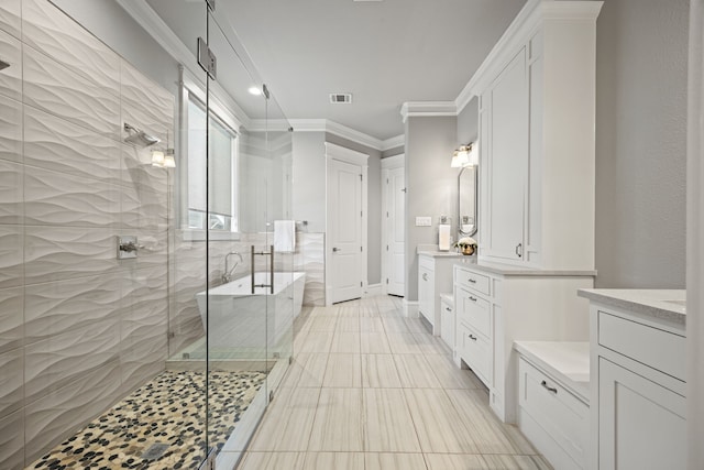 bathroom featuring vanity, crown molding, and independent shower and bath