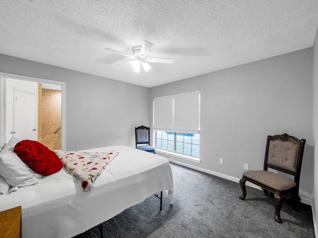 carpeted bedroom with ceiling fan and a textured ceiling