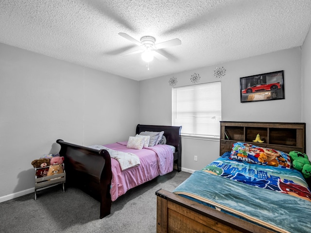 carpeted bedroom featuring ceiling fan and a textured ceiling