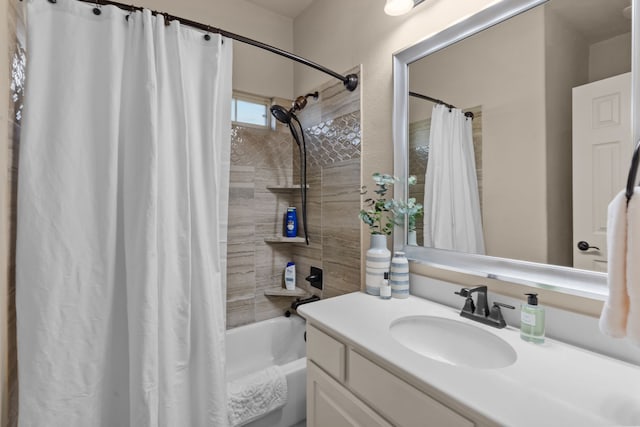 bathroom with shower / bathtub combination with curtain and vanity